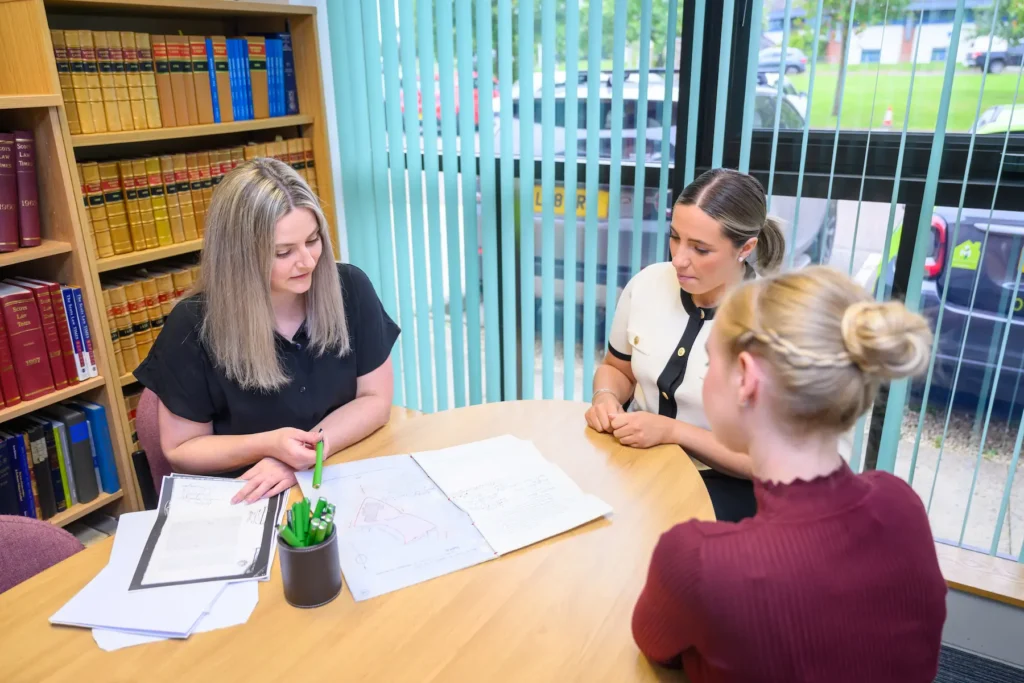 Conveyancing solicitor reviewing property documents for a home in Inverness